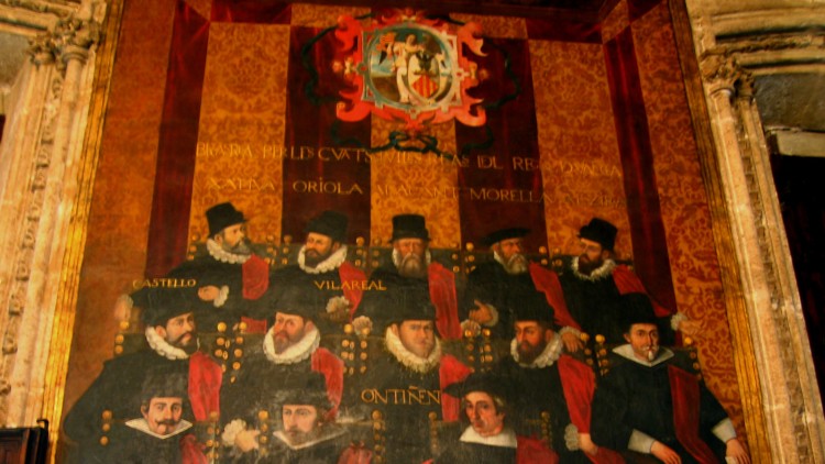 Mural que representa l'estament de les ciutats de les antigues Corts Valencianes, ubicat al Saló de Corts de la Generalitat Valenciana, denominada Diputació del General durant l'etapa de l'antic regne valencià| GVA/Viquipèdia. 